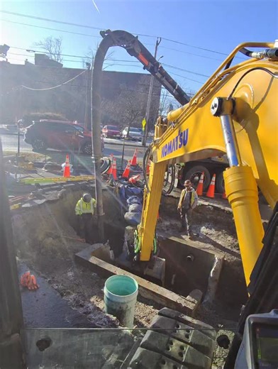 Using the @steelwrist_northamerica rotator to clean up inside a vault before pipe install. Pc138 with a rotator can handle just about anything big and small! #boston #excavation #laborer #water #sewer | LMA Services