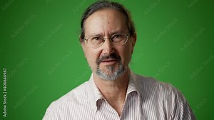 Mature man smiling looking at camera, remote presentation concept. Portrait of positive man with glasses web video chat, actively gesture with hands. Front view and close-up