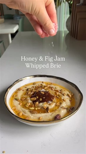 This easy whipped Brie dip recipe is what dreams are made of! Fluffy whipped Brie, toasted pistachios, crunchy fig jam and a sweet drizz of honey 🫣 it’s so good and so FALL coded! Switch up the toppings to your hearts desires - I’m lookin at you pumpkin butter and candied pecans 😍 Comment “cheese plz” to get the full recipe sent straight to your inbox! ⭐️ 2 8 oz wheels Brie Cheese ⭐️ 3 tablespoons Honey, divided ⭐️ 2 tablespoons Fig Jam ⭐️ 1 tablespoon Toasted Pistachios, roughly chopped ⭐️ 1 