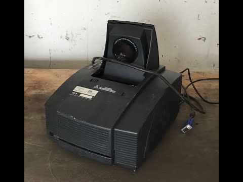 Scrapping a portable projector for copper, aluminum, gold, and other items.