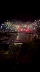 Fireworks showered Brisbane in colours for Riverfire on Saturday night, with people setting up camps across the city. The 20-minute light display drew cheers and gasps from busy crowds, with drones shooting fireworks from above the Story Bridge. | Courier Mail
