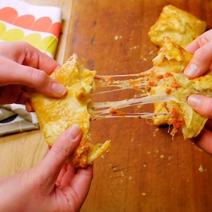 49K views · 304 reactions | It's like a heavenly cross between a Greggs pasty and a slice of pizza.  Full recipe: https://trib.al/ir1sU5a (via Delish UK) | Delish | Facebook