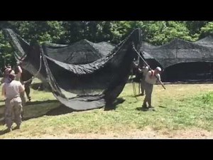 220th Engineer Company builds hasty cover.