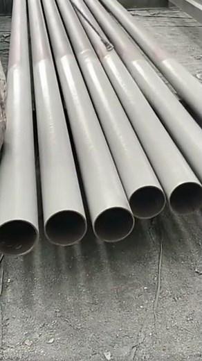 spraying rust-resistant liquid on iron pipes