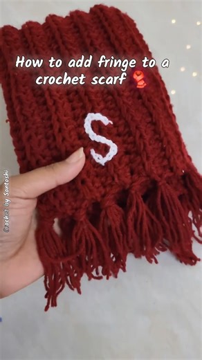 How to add fringe to a crochet scarf 🧣 #crochet #crochetscarf #explore #video #fyp #crochetprojects