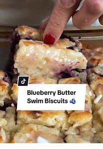 Make some room on your plate for these ooey, gooey, Blueberry Butter Swim Biscuits. 🫐 Blueberry biscuit dough is poured into melted butter, scored, baked, and lemon-glazed. They're moist, buttery, toasty, and just so incredibly delicious! 🤤 Tap the link in @allrecipes bio to get the recipe, or keep reading: Ingredients: 1/2 cup butter 2 1/2 cups all-purpose flour 2 tablespoons white sugar 1 tablespoon baking powder 1 teaspoon kosher salt 1/2 teaspoon lemon zest 1 cup fresh blueberries 2 cups b