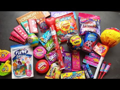100 candies opening, chocolate a video, lots of chocolates, Cadbury celebration, surprise toys