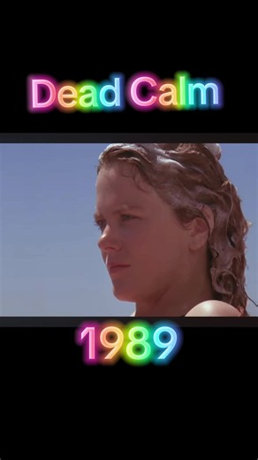 Dead Calm (1989) is a psychological thriller starring Nicole Kidman, Sam Neill, and Billy Zane. After losing their son, a married couple sails into the Pacific Ocean to escape their grief. They rescue a young man from a sinking ship, but soon discover he is dangerous. When he takes control of their yacht, the wife must fight to survive and outsmart him in the middle of the ocean. #80smovies #nicolekidman #viraltiktok #deadcalm #thrillermovie