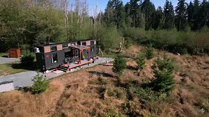 Her Island Tiny House with a First Floor Bedroom