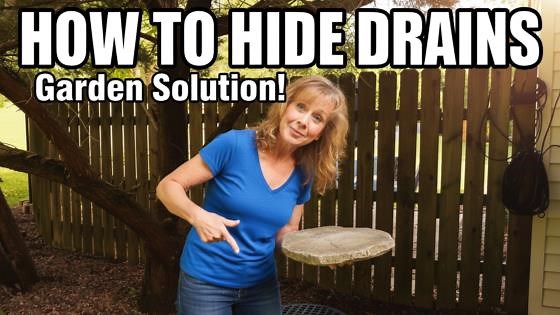 Tips for hiding downspouts and drains to enhance your yard