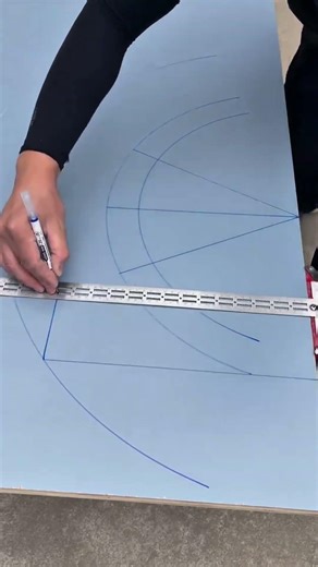 Drawing parallel lines and measuring lines on blueprint prints using a ruler and marker #viralshorts