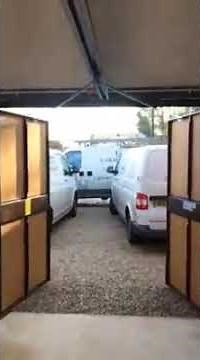 Inside View of a Garador Timber Hinged Doors with An Automated Hormann Uk Promatic Operator