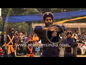 Nihang Sikh warriors display martial skills with weapons