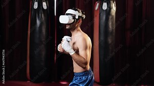 Boxer training utilizing VR technology or virtual reality, wearing VR headset with immersive boxing training technique using controller to enhance his skill in boxing simulator environment. Impetus