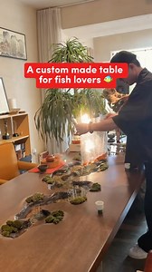 9.8K views · 13K reactions | A custom made table that doubles up as a tiny fish pond?! What are your thoughts on this statement piece? 樂 —— Renovating soon? Look for top Interior Designers & real reviews on Hometrust.sg ❤️✨ #interiordesign #sghome #sgrenovation #carpentry #bto #hdb #renovation #fish #table | Hometrust.sg | Facebook