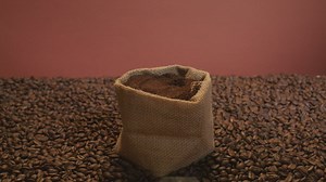 Man taking a spoonful of coffee powder - Free Stock Video