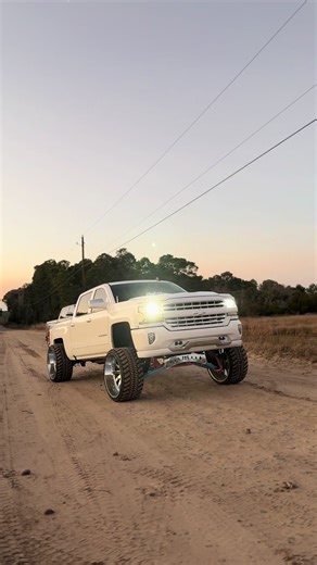Custom Chevy Silverado Squatted Trucks at Sunset