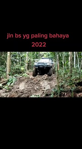 Off-Road Vehicle Adventure Through Muddy Terrain