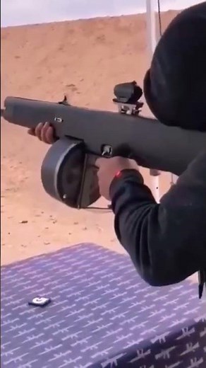 Firing an Atchisson AA-12 shotgun #shotgun