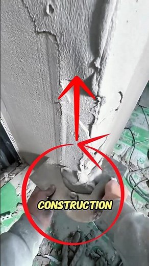Satisfying Wall Plastering Repair — Fixing Damaged Concrete Surface with Trowel.