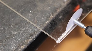 This blade is made from printer paper and it can cut through wood like it's butter
