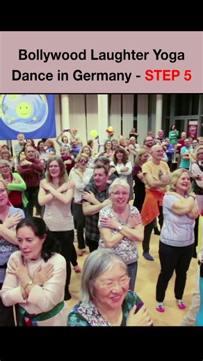 Bollywood Laughter Yoga Dance in Germany Step 5 I Dr Madan Kataria�A joyful blend of singing, dancing, playing, and laughing – the 4 elements of joy 🌟 This energetic fusion is like Zumba with laughter! It boosts your heart rate, improves cardiovascular fitness, and keeps you stress-free, emotionally balanced, and your immune system strong. Medical research shows that singing and laughter reduce stress, improve lung capacity, lower blood pressure, and elevate mood. Dancing and playing add moveme