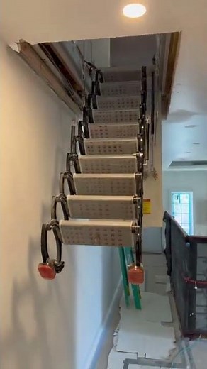 Customer easily installs custom sized remote controlled attic stairs