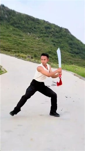 The broadsword slashed at the heads of the Japanese soldiers.#Traditional martial