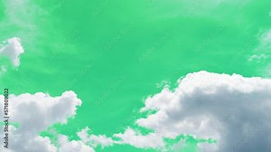 The green screen of moving white clouds with 4K resolution. Can use to change the background color.