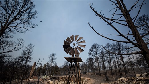 New Mexico fires that evacuated 8,000 curbed by rain, but residents face flash floods