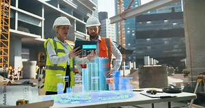 Diverse Architect Couple Working on a Construction Site, Using a Futuristic Augmented Reality Software with a Building 3D Blueprint Visualization. Male Engineer Interacting with the Hologram Stock Video