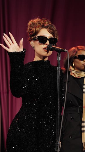 130K views · 8.6K reactions | It’s officially a @raye holiday. Tonight in New York City, the British singer-songwriter performed a medley of hits—including “Where Is My Husband!” and a jazzy spin on “Jingle Bells”—to celebrate the new @burberry-wrapped façade and store windows at @bloomingdales. | ELLE Magazine (US) | Facebook