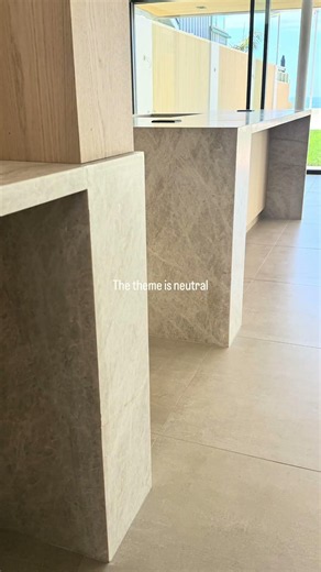 The theme is neutral - Taj Mahal, Travertine and Limestone custom stone installation