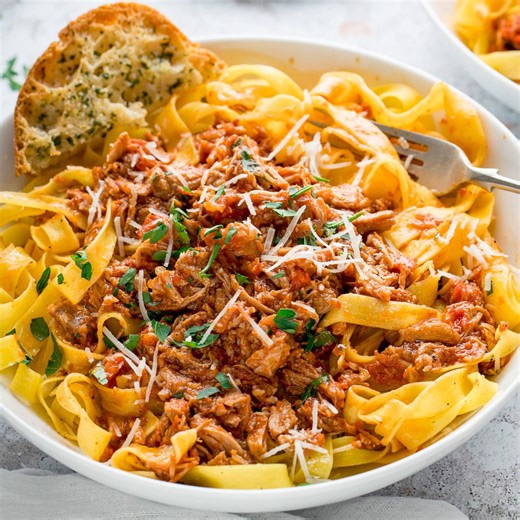 Rich and Tender Pork Ragu This Rich and Tender Pulled Pork Ragu with pasta is juicy, fall-apart, slow-cooked pork, coated in hearty flavours of tomato, garlic, red wine and herbs. Get it going in the morning and you'll be coming home to a house that smells divine, and a pasta dish you can have on the table in 10 minutes. 😋 Grab the full recipe here --->⁠https://www.kitchensanctuary.com/rich-and-tender-pork-ragu/ #dinnertonight | Kitchen Sanctuary