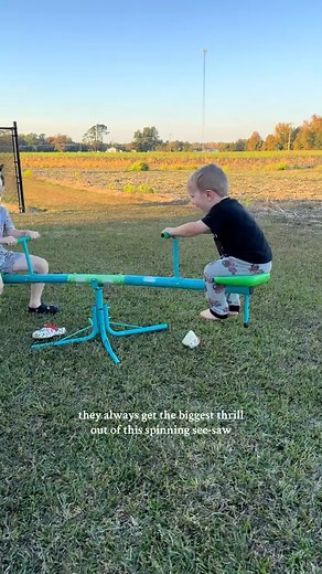 This seat and spin, seesaw, teeter totter, is one of the children’s favorite things to play with outside. And Hanks contagious laughter is the sweetest thing ever! #christmasgiftideas #kidstoys #jackofthesouth #blackfriday #kidsgifts | Three Little Ones