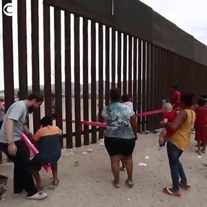 21K views · 216 reactions | WATCH: Children and adults played on these pink seesaws on the border between Mexico and United States on Sunday, near El Paso, TX. One of the two architects who worked on the project said it's a reminder that what happens on one side of the border affects the other. | WTVR CBS 6 News | Facebook