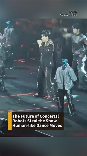 😍The Future of Concerts? China's Unitree robots shared the stage with singer Wang Leehom, performing synchronized and complex dance moves as well as flips. Elon Musk retweeted the video, praising it as "impressive." #China #robot #concert #dance #ElonMusk #fyp #Unitree | Phoenix TV English