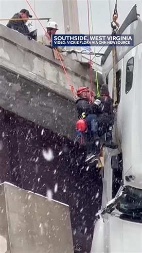 Dramatic video shows emergency crews pulling a driver from a tractor-trailer dangling off a West Virginia bridge. The rescue took place after a crash on slick roads on Dec. 2. http://www.wlky.com/article/wv-tractor-trailer-rescue/69616852 | WLKY News