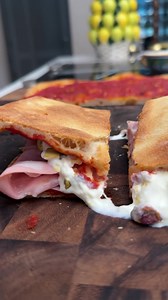 Pizza rossa panino with mortadella, stracciatella, and pistachio ❤️ It doesn't get any better than this! See recipe below. - 2 slices pizza rossa (see previous reel for recipe) - 6 slices mortadella - stracciatella cheese, QB or as desired - 1 lemon, zest - 1/4 cup pistachio, chopped Top one slice of pizza rossa with mortadella, stracciatella, lemon zest, and pistachio. Add the second slice of pizza rossa on top for a delicious panino. Enjoy! | DAVID ROCCO