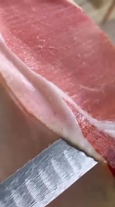 Prosciutto Crudo, Italy 🇮🇹 Explore Italy: tasteatlas.com/italy Hand-sliced prosciutto crudo is a hallmark of Italian salumeria. Each thin slice reveals the balance of salt, aging, and marbling that gives this cured ham its delicate aroma and flavor. Credits: @paciottistefano | TasteAtlas