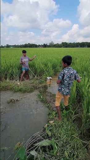 Village Boys Creating Water Flow by Hand!