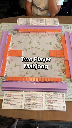 How to Play 2-Player Mahjong Not Siamese Mahjong, and not NMJL rules. This is the way we play with two players using one rack each. Each player builds a wall 19 tiles across and 2 tiles high. Then build your ghost walls: • 19 tiles across, 1 high • 7 tiles across, 1 high • Four rows of 3 That gives you enough tiles to do a full Charleston, including right over left and left over right. Then you’re ready to play! Save this video and send it to someone you’d play 2-player mahjong with. 🀄️ #mahjon