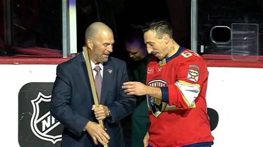 Brad Marchand receives a golden hockey stick to commemorate his 1000-point milestone 🏒 | Sportsnet