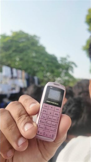 The Tiniest Phone Ever ? Comment Below