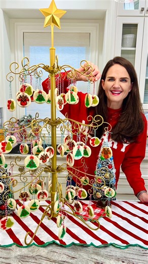 8.7K views · 68 reactions | Cookie Ornament Tree! Bake up an assortment of Pillsbury's festive holiday sugar cookies, then string with twine. Decorate a Christmas tree and set out at your next holiday brunch or dessert table! | The Bakermama | Facebook