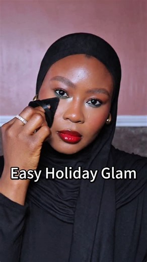 Zainab Iye | Beauty Content Creator | Influencer on Instagram: "Quick & easy holiday makeup you can wear to any festive event 🍒💋✨ Red lips, soft glam, and beginner-friendly steps. Save this for your next outing 🤍 . Products used: @niveausa lip therapy ROSY lips @belif_uk @belif true cream-AQUA BOMB moisturizer @msmetics spf50+ Sunscreen @msmetics AQUA grip primer @lorealparis True Match foundation in C6 COOL MEDIUM @milkmakeup future fluid concealer in 22NW @milanicosmetics compact powder in 