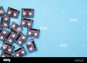 Vintage mini DV cassette tapes used for filming back in a day. Pattern made of plastic video tapes on blue background Stock Photo - Alamy