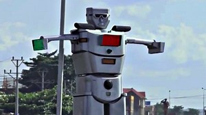 Giant solar-powered traffic-directing robot strikes fear into rude drivers' hearts