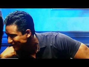 Mario Lopez flexes his bicep!
