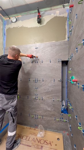 Installing Porcelanosa ceramic tiles, 1200×450 mm.This tile has a delicate glazed surface, so careful handling is essential.🧱 Tile Leveling System: 0.5 mm📏 Joint thickness: up to 1 mm🔧 Adhesive applied to both the tile and the substrate for maximum bonding. | Mykhailo Kutiepov